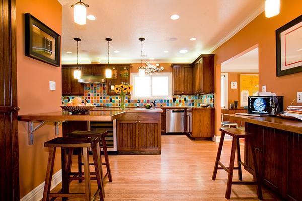 Оранжевый цвет лучше всего подойдет для кухни: он возбуждает аппетит и настраивает на положительные эмоции 