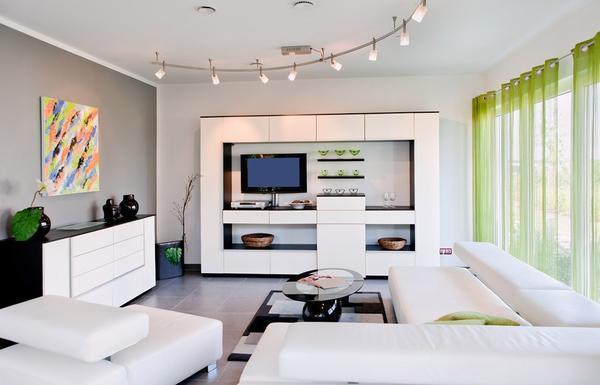 В интерьер гостиной в стиле хай-тек прекрасно впишется стильная модульная мебель с глянцевой поверхностью