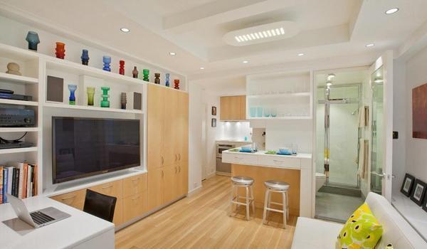 Совмещение кухни и гостиной будет отличным вариантом для небольшой квартиры, однако и недостатки у такого решения также имеются