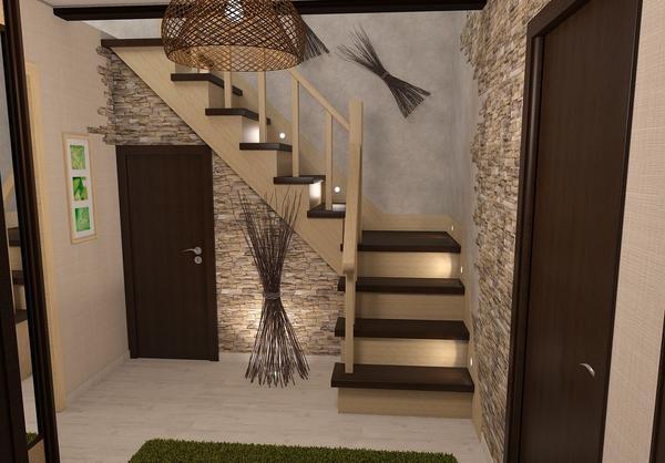 Стены в прихожей в частном доме можно оформить с помощью обоев, имитирующих кирпич или натуральный камень 