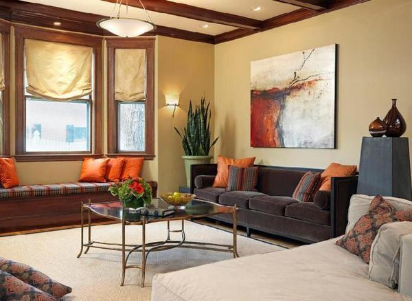 В гостиной картины среднего размера органично смотрятся над диваном или креслами