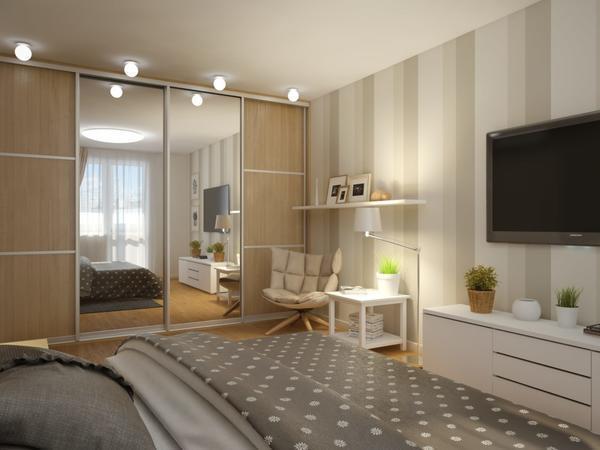 В спальне прямоугольной формы лучше всего установить встроенный шкаф с зеркалами