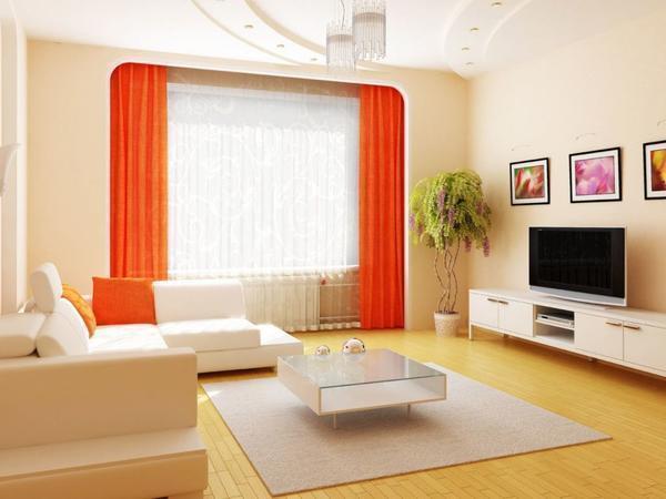 Яркие оранжевые шторы отлично подойдут для оформления гостиной в современном стиле 