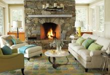 stone-fireplace-vacation-home-lodge-style-beach-colors-spa-living-room