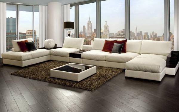 Для обустройства гостевой комнаты большого размера дизайнеры рекомендуют подбирать модульный диван угловой формы