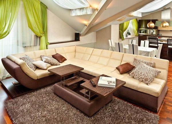В интерьер современной гостиной прекрасно впишется угловой диван с удобным спальным местом