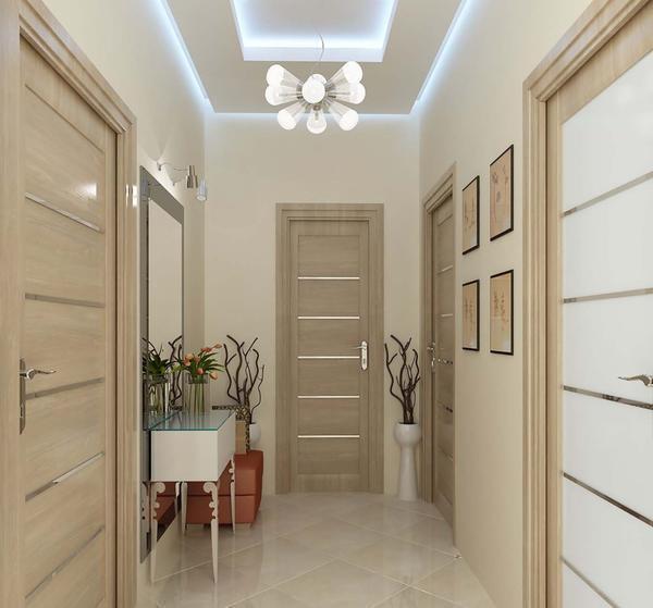 Для узких коридоров отличным решением будет оклеить стены светлыми обоями, которые визуально сделают комнату больше